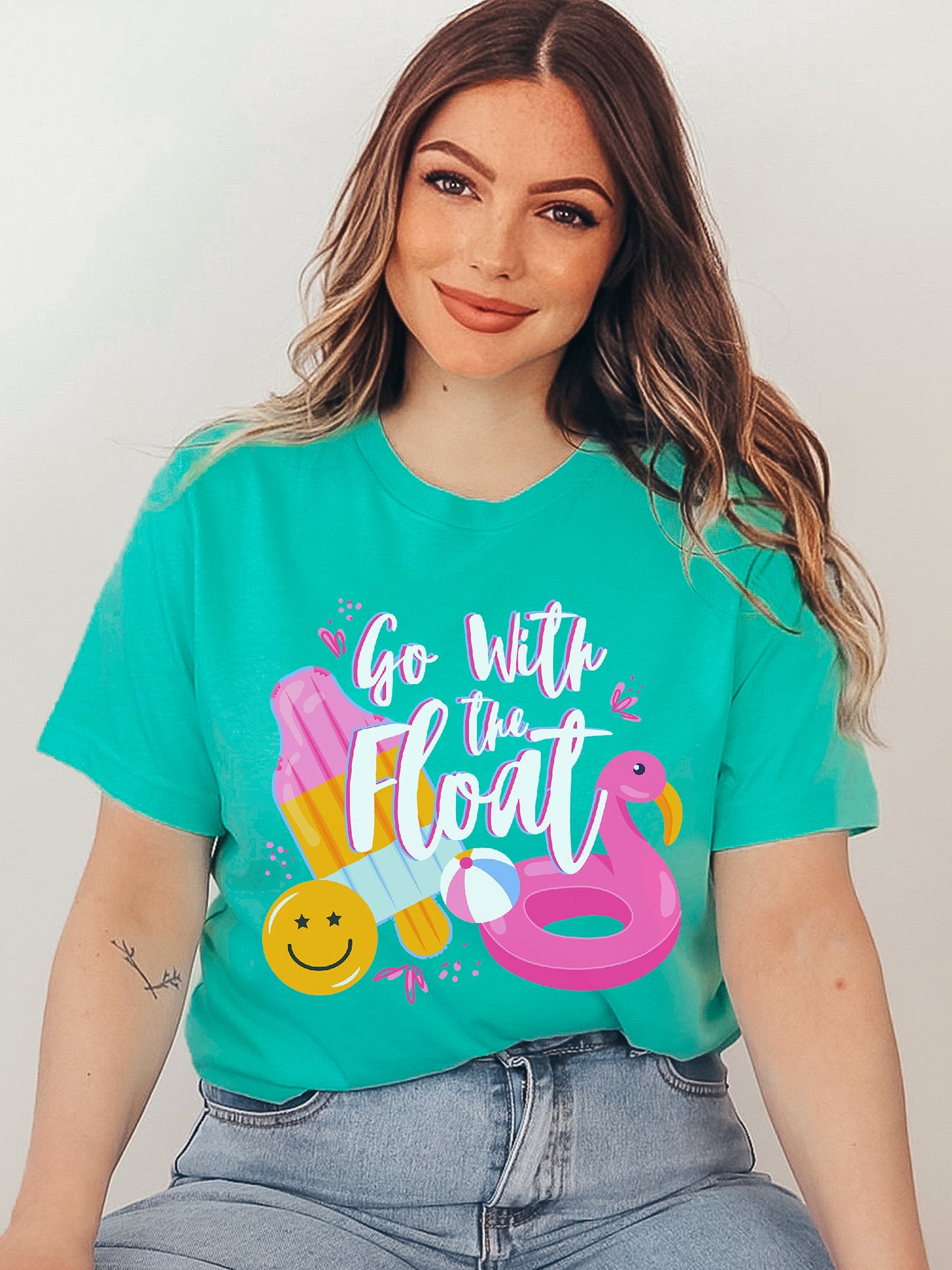 Go With The Float Teal Graphic Tee